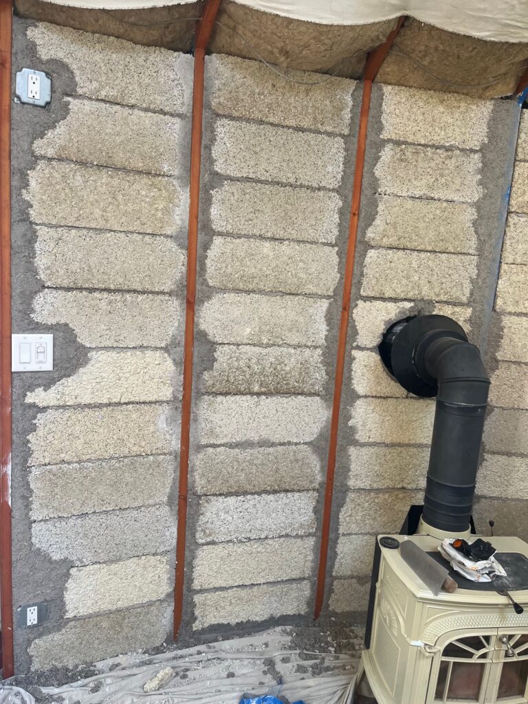 Hempcrete blocks installed in yurt for Deep Energy Retrofit.