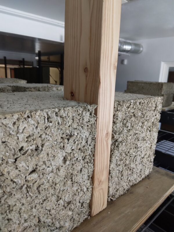 Hemp Block with middle notch for fitting around stud framing